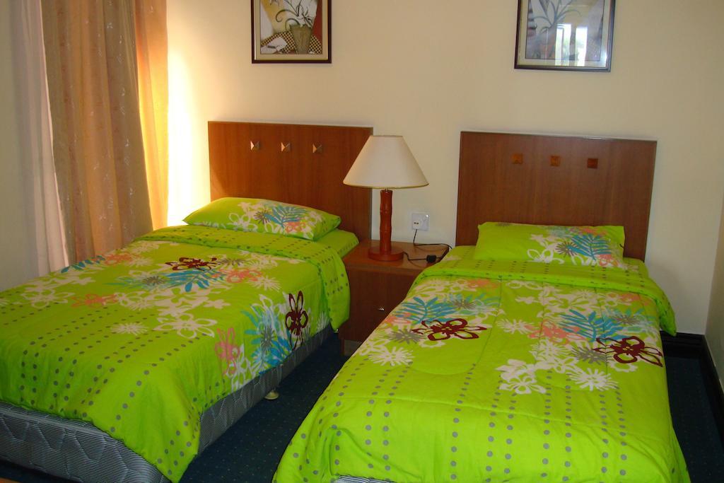 Dorcas Service Apartment - Marina Court Κότα Κιναμπαλού Δωμάτιο φωτογραφία